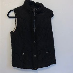 Black with white fur vest